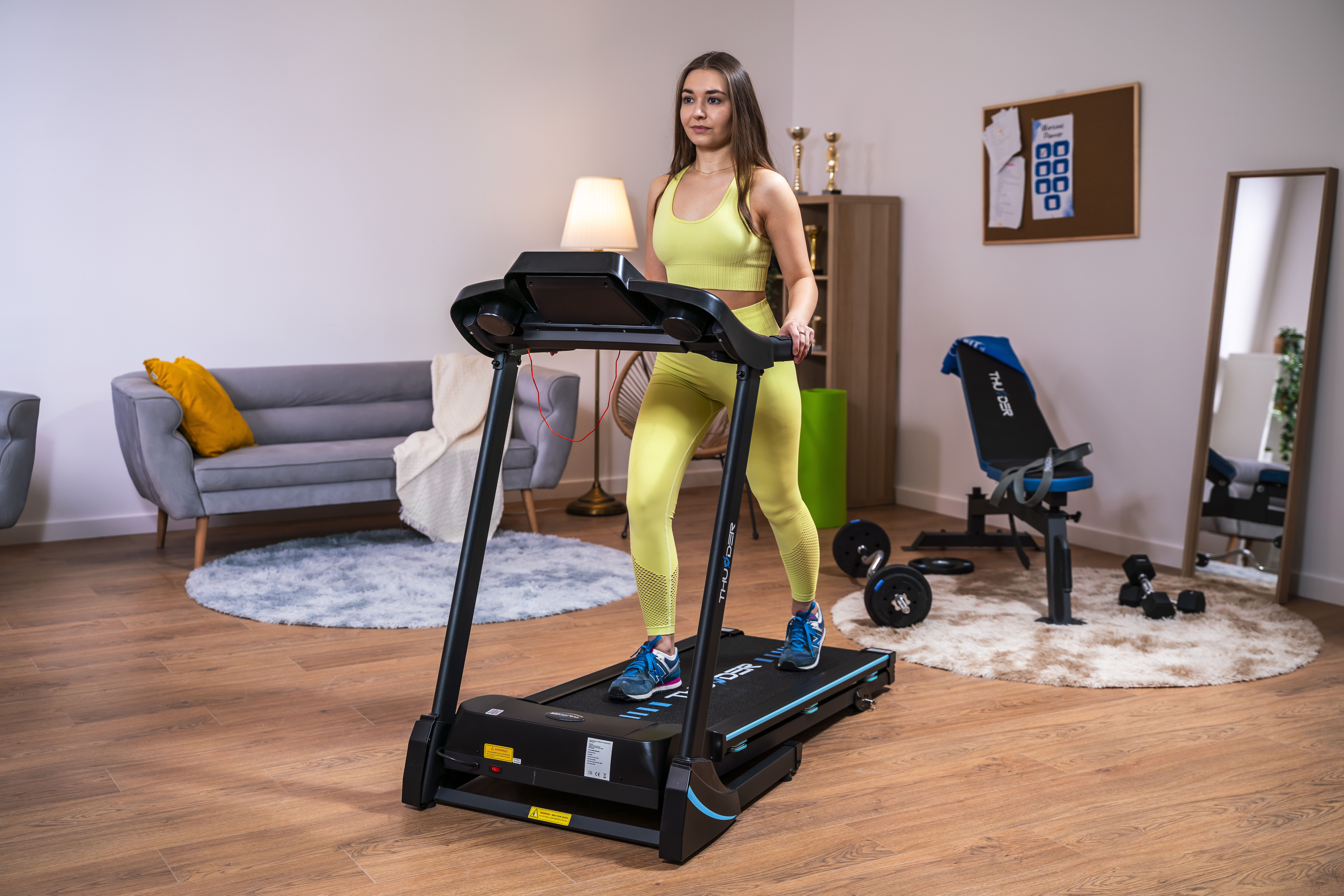 Modern electric treadmill in a home environment